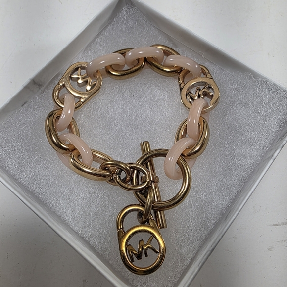 Elegant Michael Kors Gold and Pink Bracelet - Picture 1 of 4